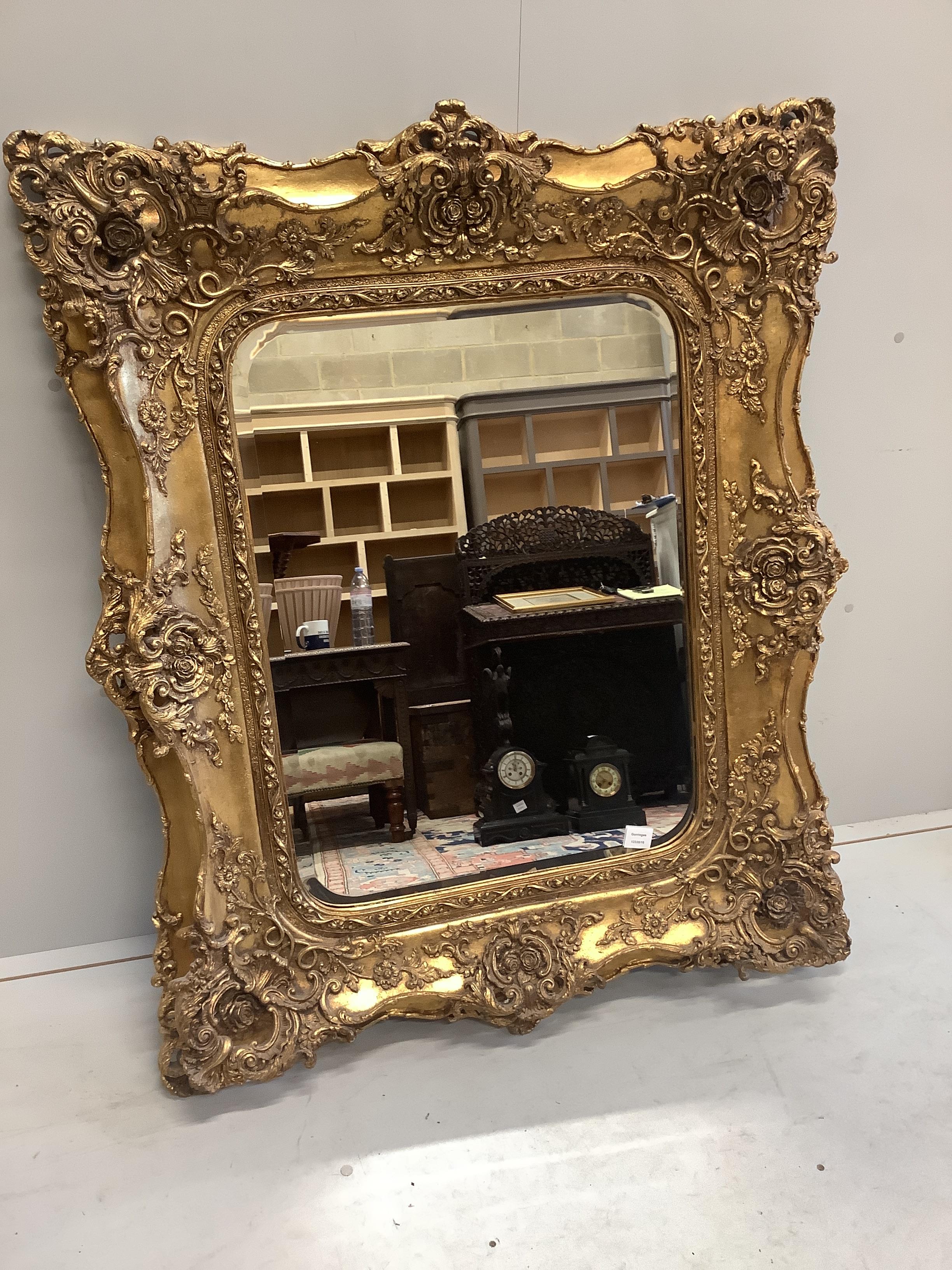 A Victorian style gilt wall mirror, width 101cm, height 126cm
